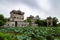 July 2017 Ã¢â¬â Kaiping, China - Kaiping Diaolou and lotus pond in Zili Village, near Guangzhou. Royalty Free Stock Photo